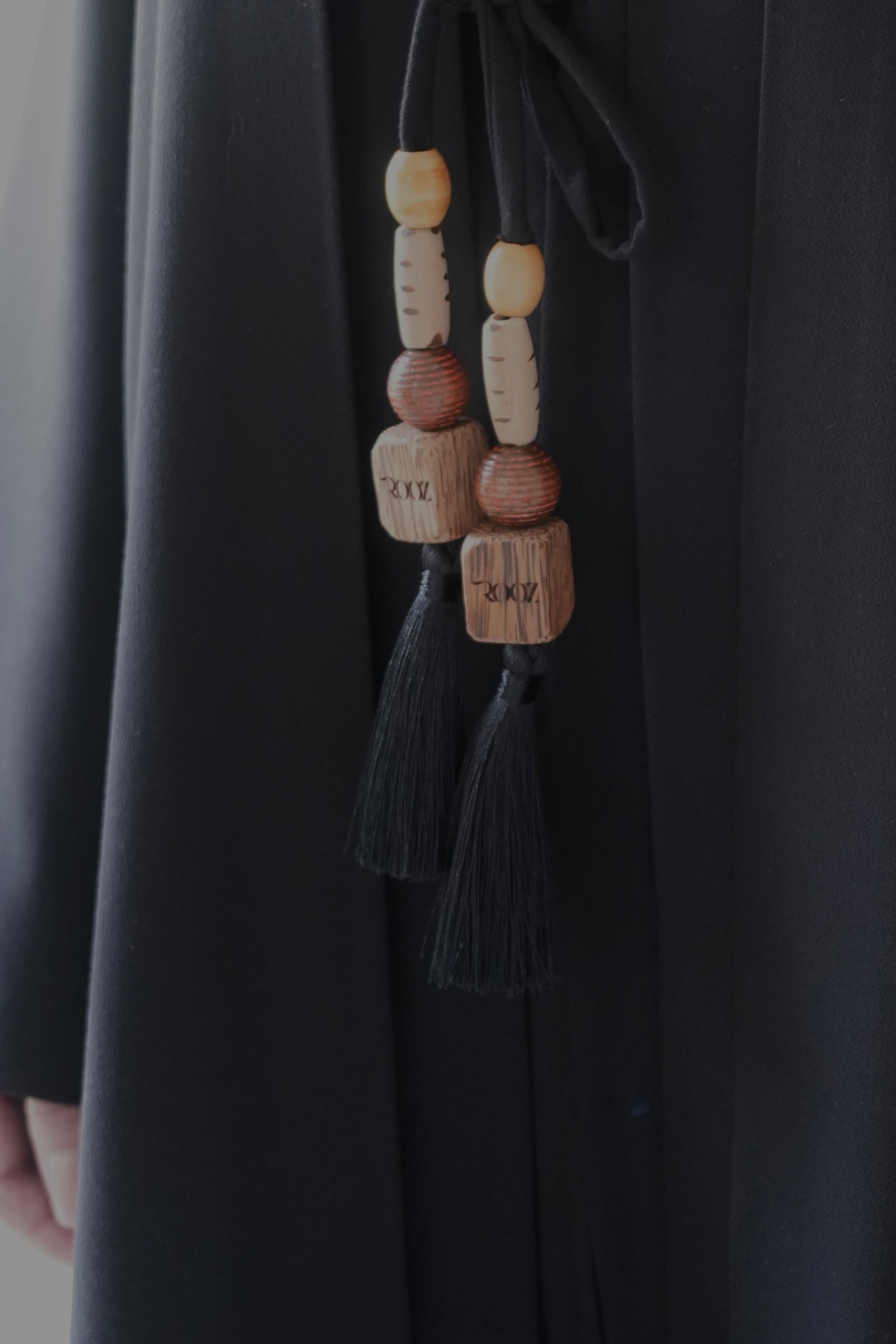 Black Wooden charm